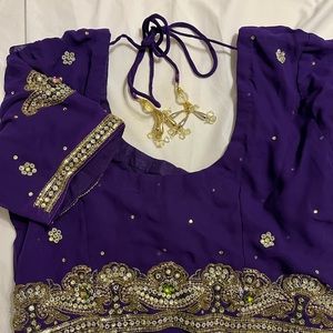 Deep purple pre-pleated saree with gold detailing